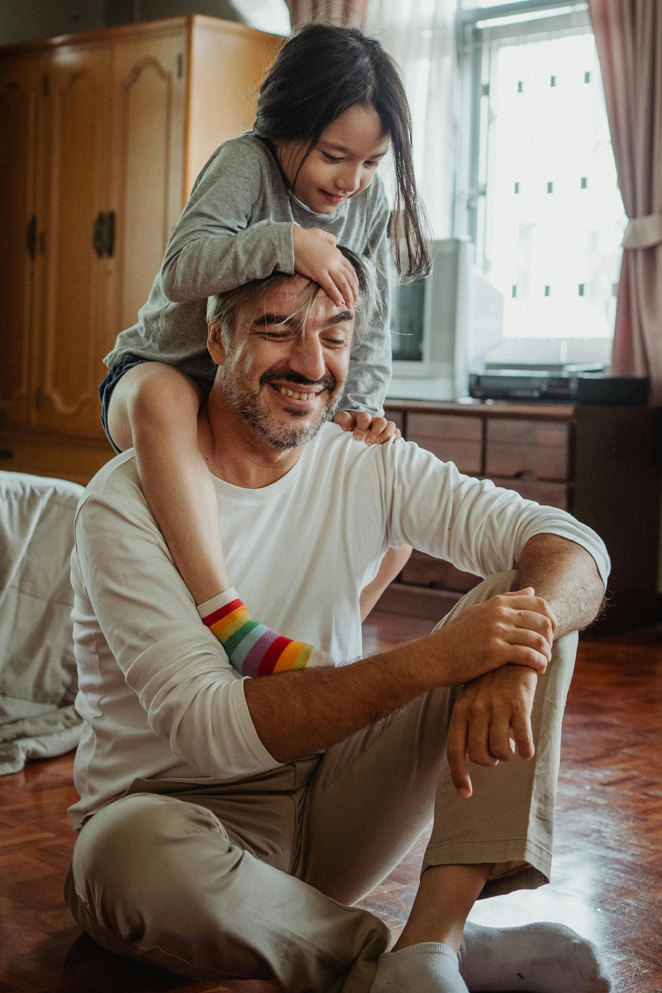 Father playing with daughter