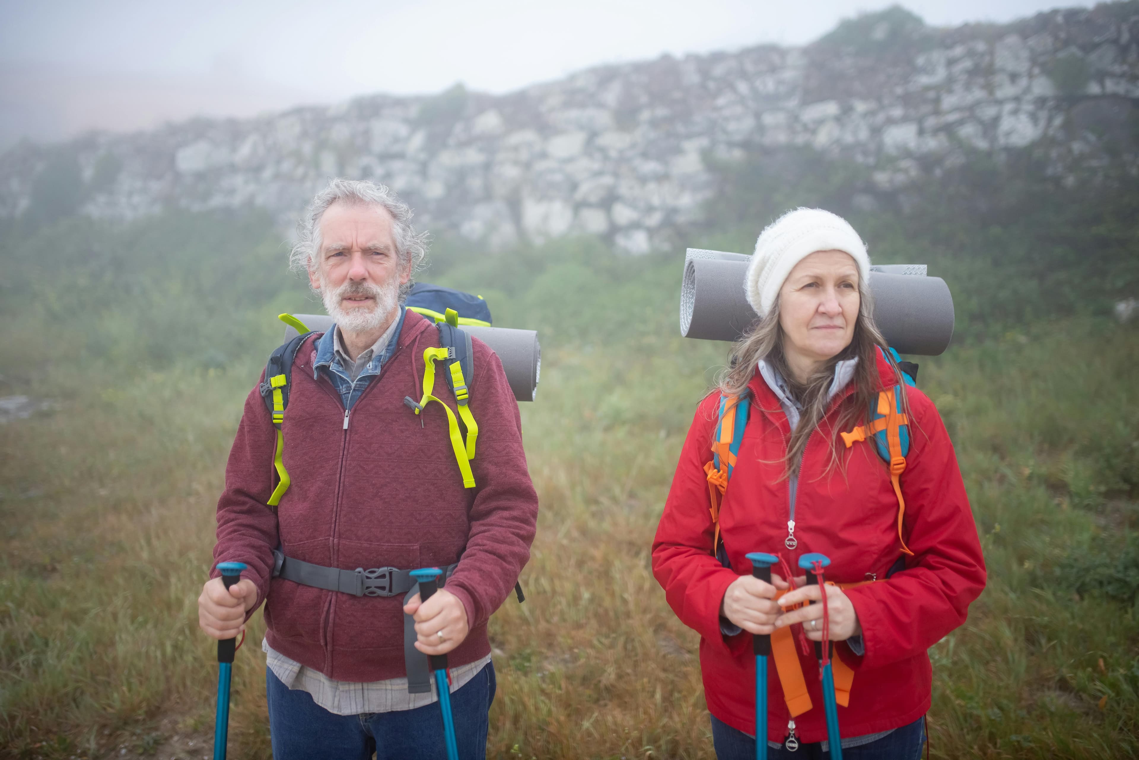 Couple hiking with backpacks
